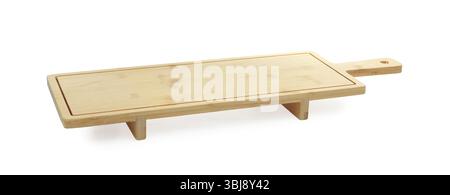 One wooden serving board with legs isolated on white. Space for text Stock Photo