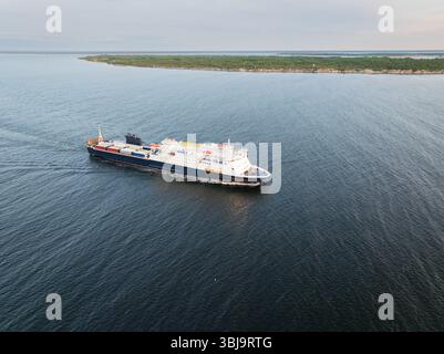 Aerial drone view of Ro-Pax cargo passenger ferry ship transporting ...