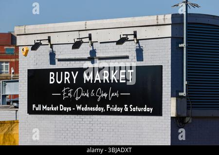 Bury market open days sign on wall in greater manchester uk Stock Photo