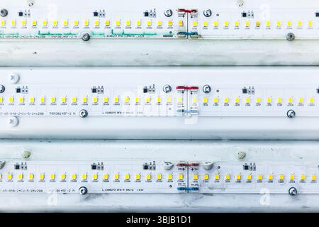 Long LED lamps stacked in a row Stock Photo - Alamy