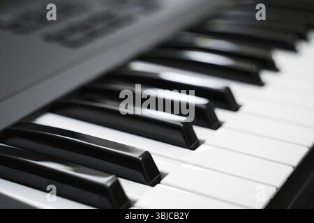 Professional midi keyboard synthesizer with knobs and controllers Stock Photo