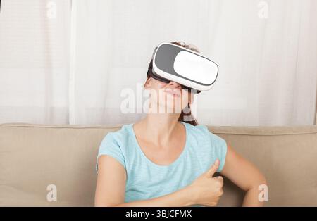 Beautiful women using VR glasses. Virtual reality Stock Photo