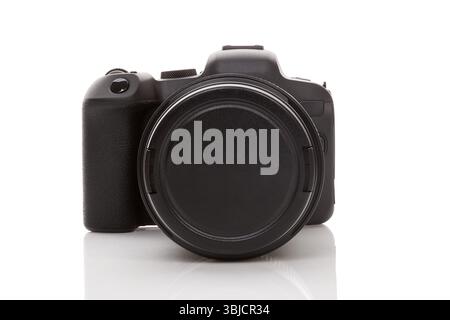 Generic digital mirrorless full frame camera isolated on white background without brand Stock Photo