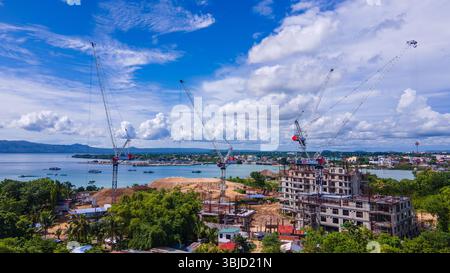 construction of a modern residential complex on a tropical island Stock Photo