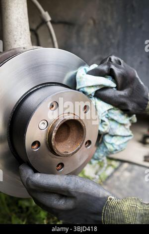 Cleaning of car disc brake system Stock Photo - Alamy