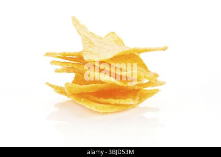 Nachos pile isolated on white background. Mexican food Stock Photo