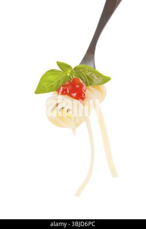 Spaghetti with tomato sauce and basil leaf on silver fork isolated on white Stock Photo