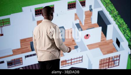 Architect Using CAD Software To Design Real Estate Remodel Project Stock Photo