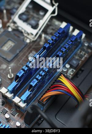 Inside of pc. Motherboard, CPU socket and RAM memory Stock Photo