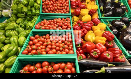 Fresh vegetables arranged in vibrant display at market Stock Photo