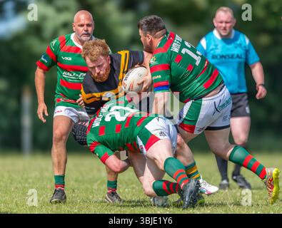 Men playing in a amateur Rugby League game Stock Photo - Alamy