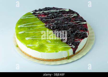 Mixed cheesecake mold, blueberry cheesecake and lemon cheesecake, isolated on white background. Stock Photo