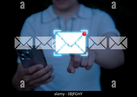 New email notification concept, business email communication, digital marketing , woman entrepreneur receives email notification on smart phone mobile Stock Photo