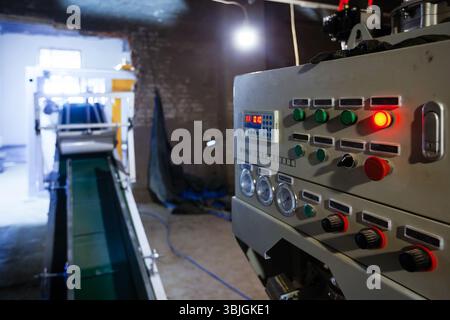 Control panel of CNC machine in industrial workshop. Stock Photo