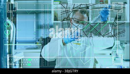Examining scientist wearing lab coat analyzing yellow test tube in lab, with digital data overlays Stock Photo