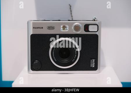 Shanghai,China-June 15th 2025: Fujifilm instax mini Evo instant camera in store Stock Photo