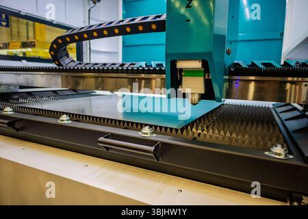 Laser Cutting Machine Precision Metal Manufacturing and Industrial Technology with Cutting Edge CNC Equipment and High Tech Automation. Stock Photo