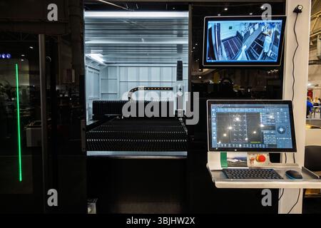 The Cutting-Edge Industrial Laser Cutting Machine with Advanced Control Panel and Automated Processing System Integration. Stock Photo