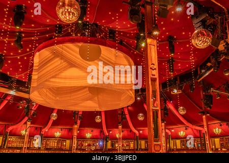 Empty stage of circus, variety or cabaret, scene stage with spotlights and stage machinery Stock Photo