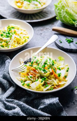 Chinese cabbage salad with carrots and green onions Stock Photo