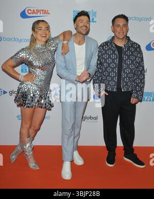 London, UK. 15th June, 2025. Sian Welby, Jordan North and Chris Stark at the Capital's Summertime Ball with Barclaycard, Wembley Stadium, Wembley, on Sunday 15 June 2025 in London, England, UK. CAP/CAN © CAN/Capital Pictures Credit: Capital Pictures/Alamy Live News Stock Photo