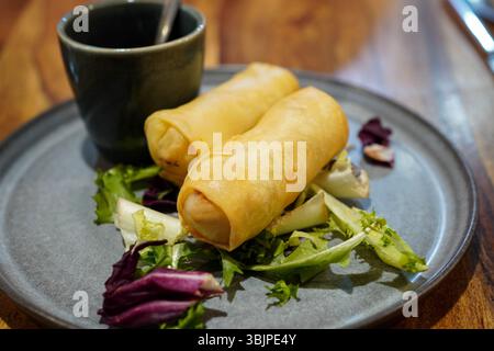 Po Pia Tawd ( crispy Thai spring rolls stuffed with rice vermicelle and vegetables) from authentic Thai restaurant Stock Photo