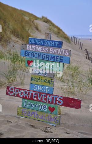 Wooden sign with lettering on the beach Stock Photo - Alamy