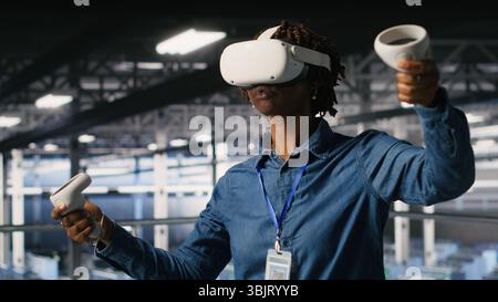 Data center admin wearing VR headset using artificial intelligence neural networks technology. Server hub developer using AI programming language and virtual reality to update hardware Stock Photo