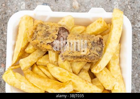 Deep fried Mars Bar and chips from Carron Fish Bar, Stonehaven, Scotland, UK Stock Photo
