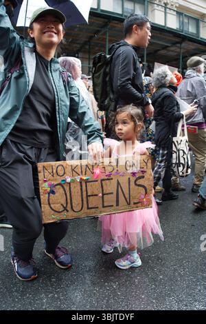 Protestors participate in the ’No Kings’ march on the National Mall in
