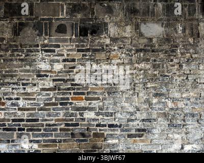 Old brick wall background, texture.Ttraditional grey black bricks. Historical Chinese architecture Stock Photo