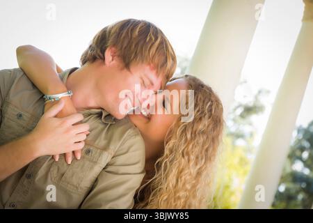 Attractive Loving Couple Portrait in the Park Stock Photo
