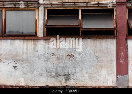 old abandoned apartment building with boarded up windows Stock Photo ...