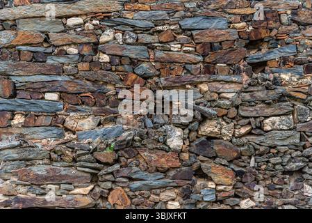 Slate slabs texture background. Pattern of black slate wall Stock Photo