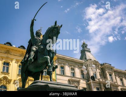 Bronze equestrian statue of Ban Josip Jelačić in Zagreb’s main square under clear blue sky. Stock Photo