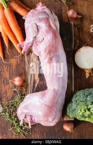 Raw rabbit with vegetables Stock Photo