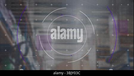 Displaying HUD overlay with rings and crosshair markers over racks of cardboard boxes in warehouse Stock Photo