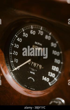 Close up hot of a vintage rpm gauge on a retro car. Stock Photo