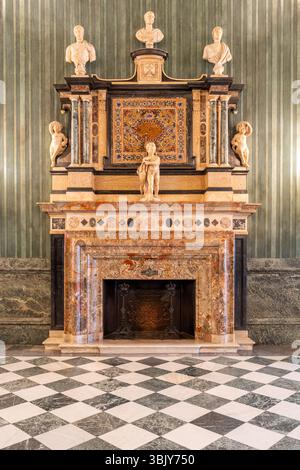 Luxurious decoration of marble chimney inside historic palace in Turin Stock Photo