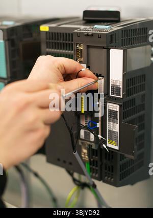 Close-up view of industrial converters at factory. Stock Photo