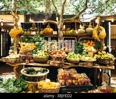 Local outdoor market. Fruits and vegetables in baskets and boxes. Stock Photo