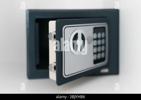 Black small home or hotel safe with keypad. Stock Photo