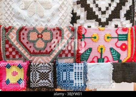 Collection of Traditional Azorean Textile Samples and Woven Fabrics. Intricate Patterns, Handmade Crafts, Cultural Heritage Stock Photo