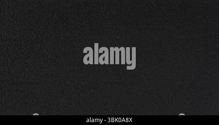 Rough black plastic surface texture macro close up view Stock Photo