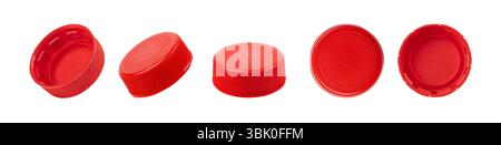 Five red plastic bottle caps shown from different angles, isolated on a white background Stock Photo