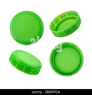 Four green plastic bottle caps isolated on white background, showing different perspectives Stock Photo