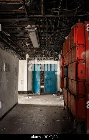Corridor with a lot of junction boxes and cables Stock Photo