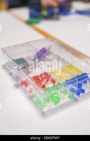 Colourful LEDs and electronic components in a plastic box on a table, Youth Research Centre Nagold, Germany, Europe Stock Photo