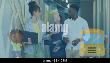 Walking three professionals discussing ideas in office corridor, with laptop tablet and artwork Stock Photo