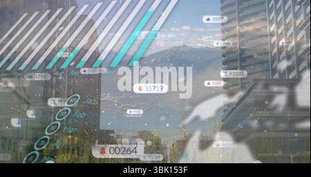 Displaying data overlay over city skyline, showing bar charts and floating notification bubbles Stock Photo